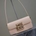 Elegant Miss Dior Flap Bag with gold hardware