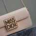 Miss Dior Flap Bag on model showcasing chic style